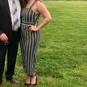 Dark green and black striped Express romper